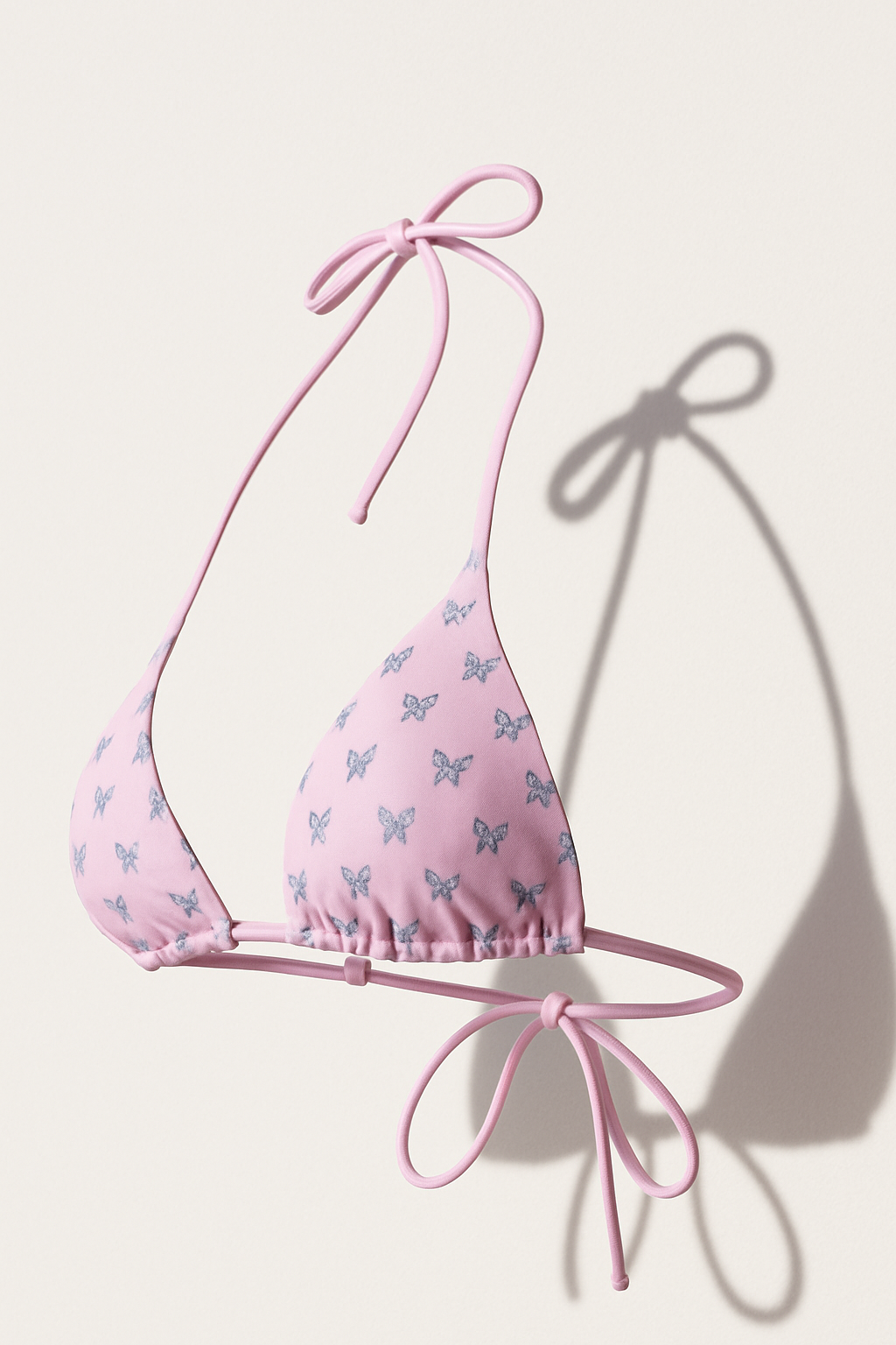 luxury swimwear design pink bikini top with butterfly details from ZanaSwim.