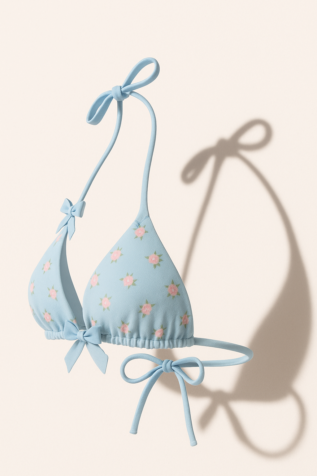 	ZanaSwim blue floral bikini top and bottoms with pink flower print and delicate side bows”